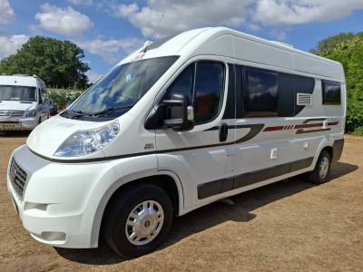 Adria Twin SF. 2013. Rear French Bed. Half dinette hosts 5.