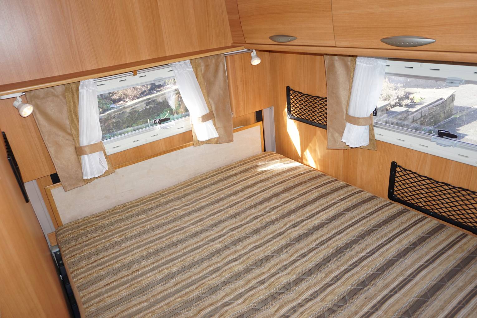 Chausson 75 4 berth fixed rear bed above garage motorhome